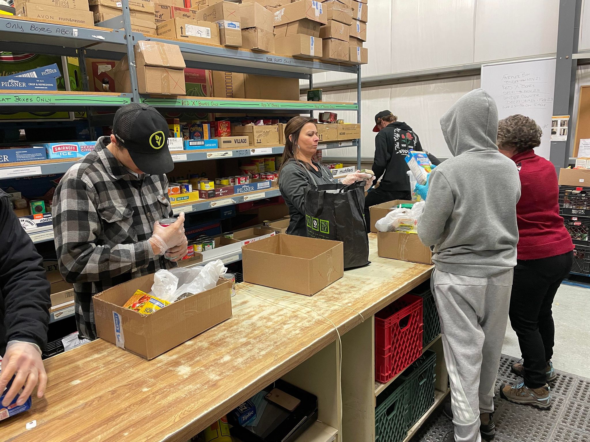 Volunteers helping out with Airdrie Food Banks Seasonal Sorting