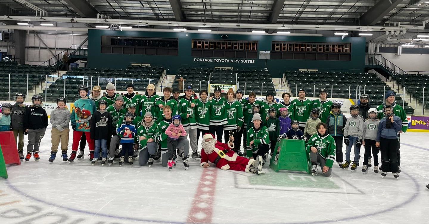 Skating into the Spirit of the Season: Santa and Portage Terriers ...