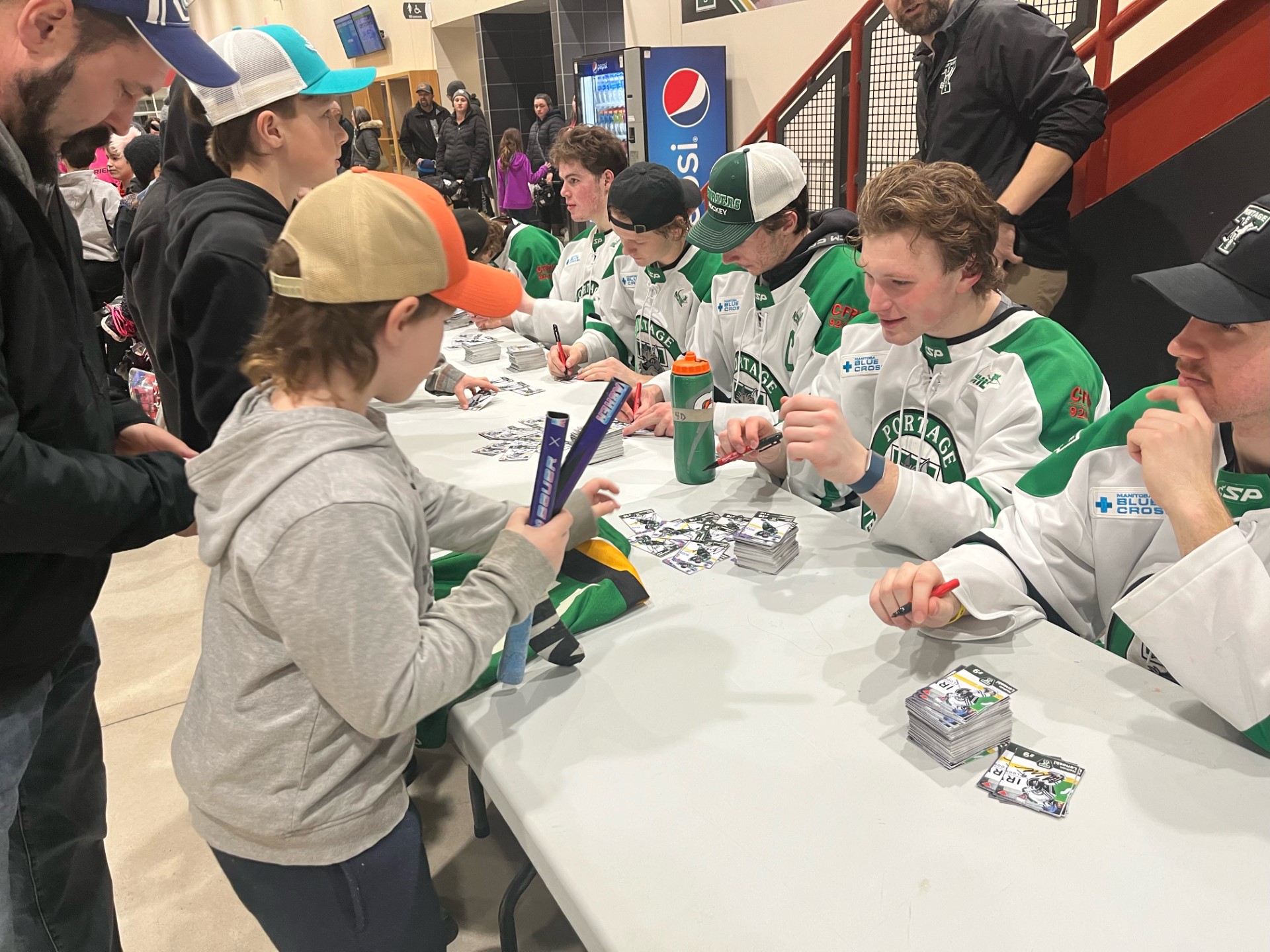Terriers skate with fans, sign hockey cards after dismantling ...