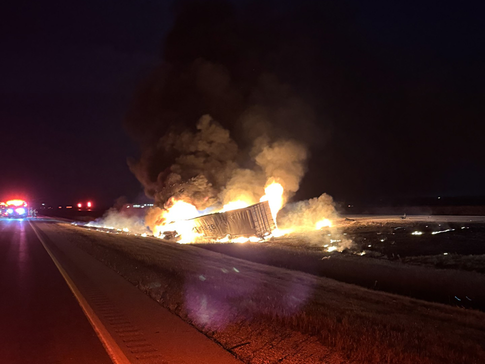 Semi and car burst into flames after headon crash