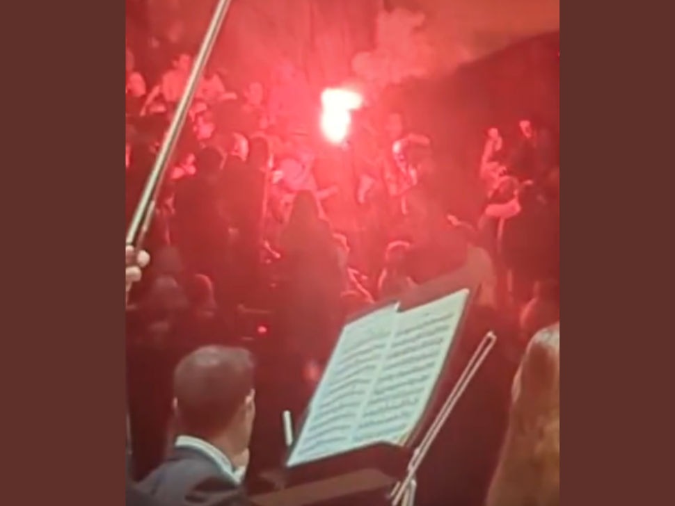 Flares, chaos, and arrests: protesters disrupt Israel Philharmonic ...