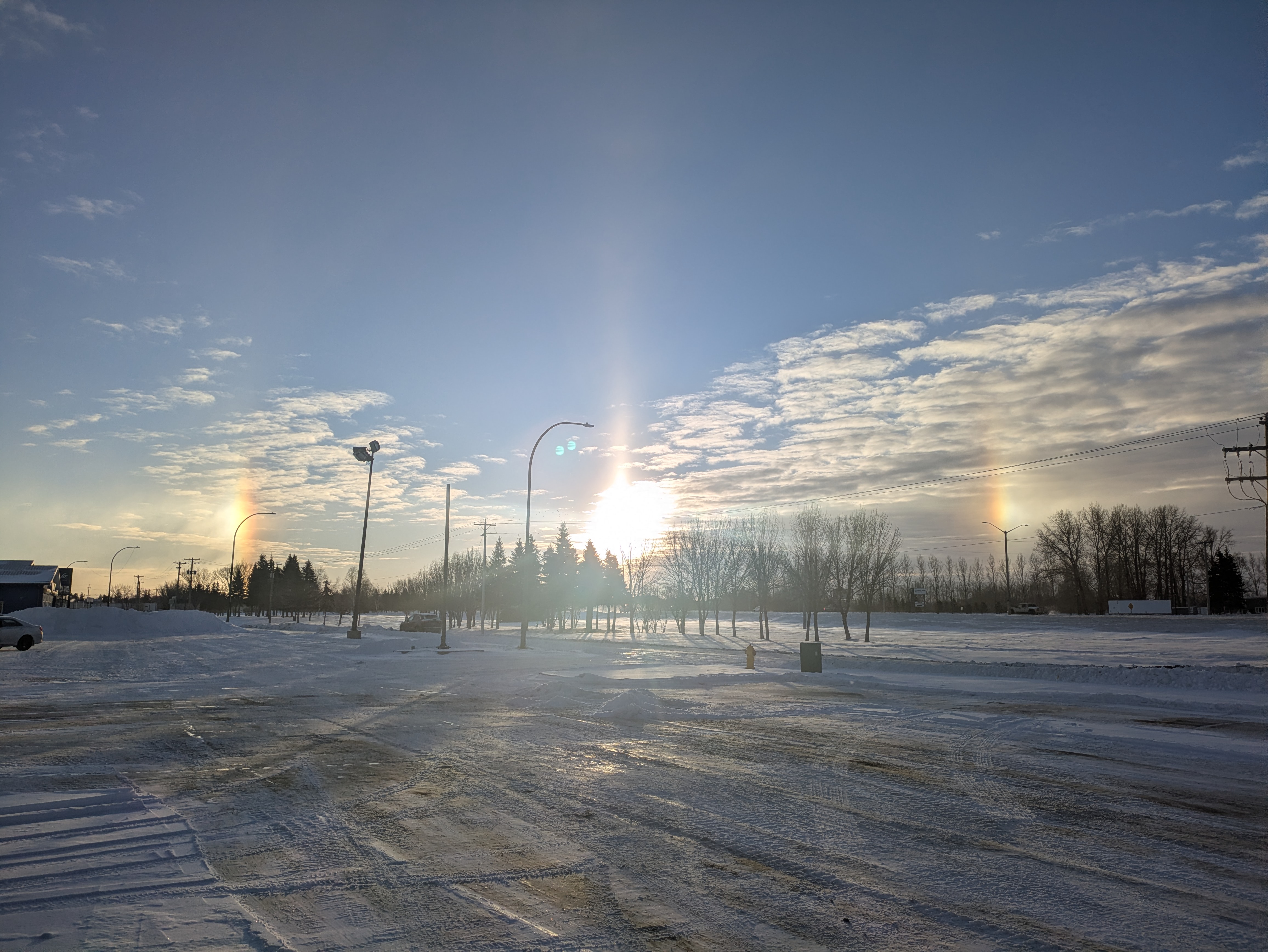 How cold air, ice crystals paint dramatic winter sky over Portage la Prairie