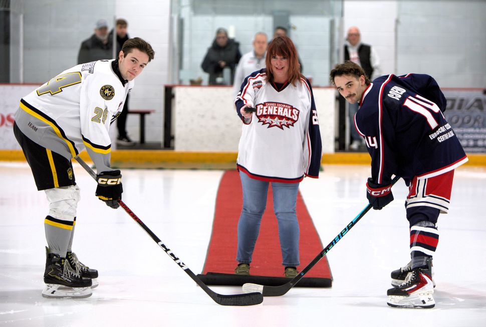 Deputy Mayor Marni Fedeyko dropped the puck between Kings captain Cole Tweit and Gens captain Diago Coelho, officially opening the HJHL playoffs in Cochrane. puck drop 1.jpg