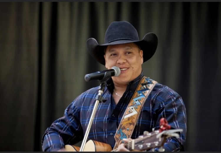 Siksika country artist takes stage at Flames game