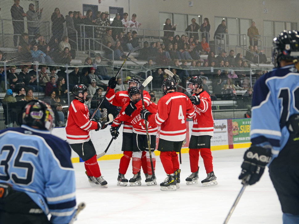 Niverville students meet RCMP officers during day-long school visit and hockey game