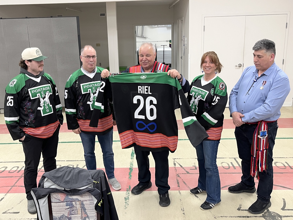 MMF president David Chartrand highlights housing, jobs, and renewable energy at Portage meeting