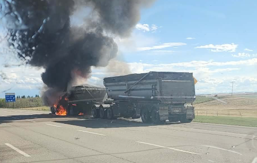 Traffic delays on QEII after semi-truck fire near Crossfield