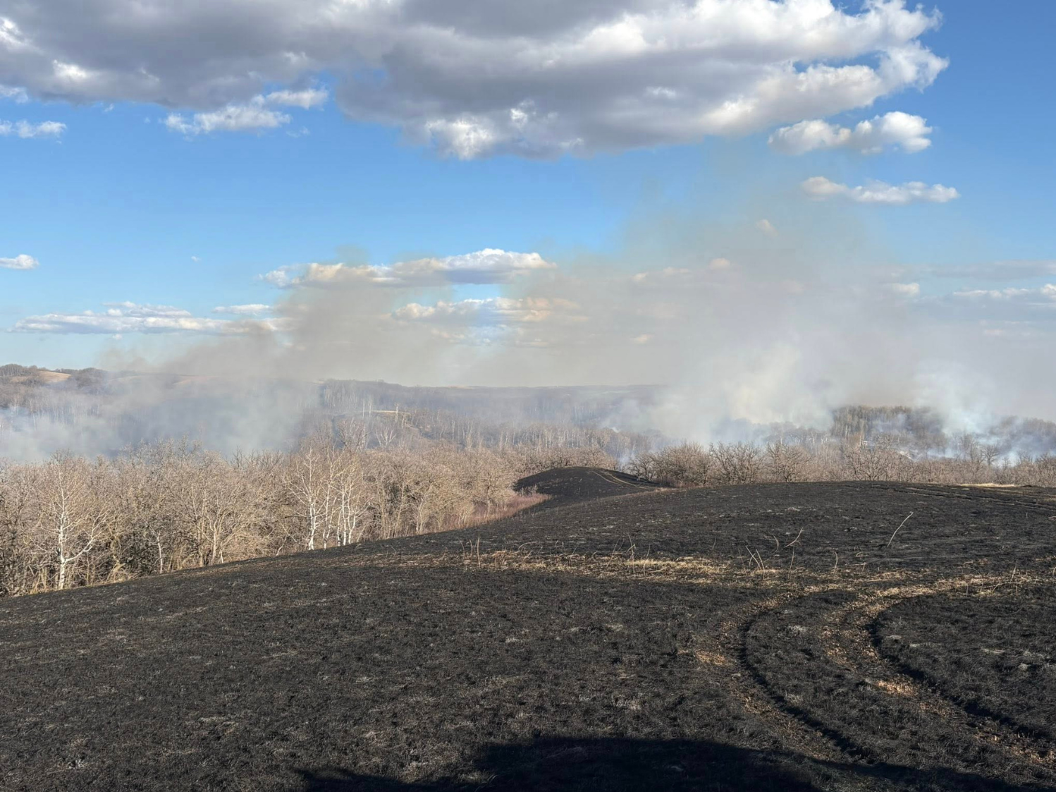 Community effort helps crews fight large grass fire near Rivers ...