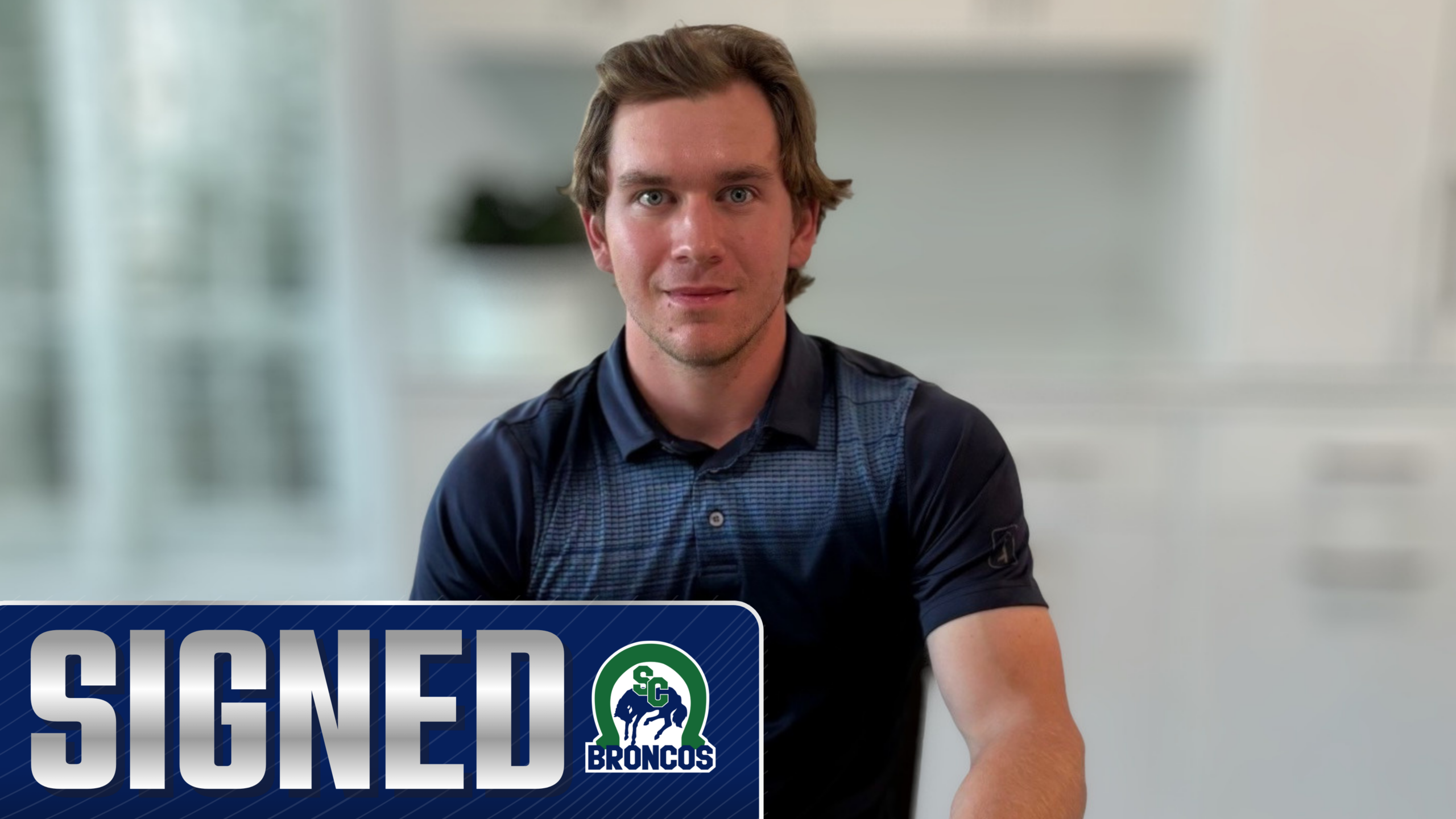 Broncos sign Michigan forward Cam Springer