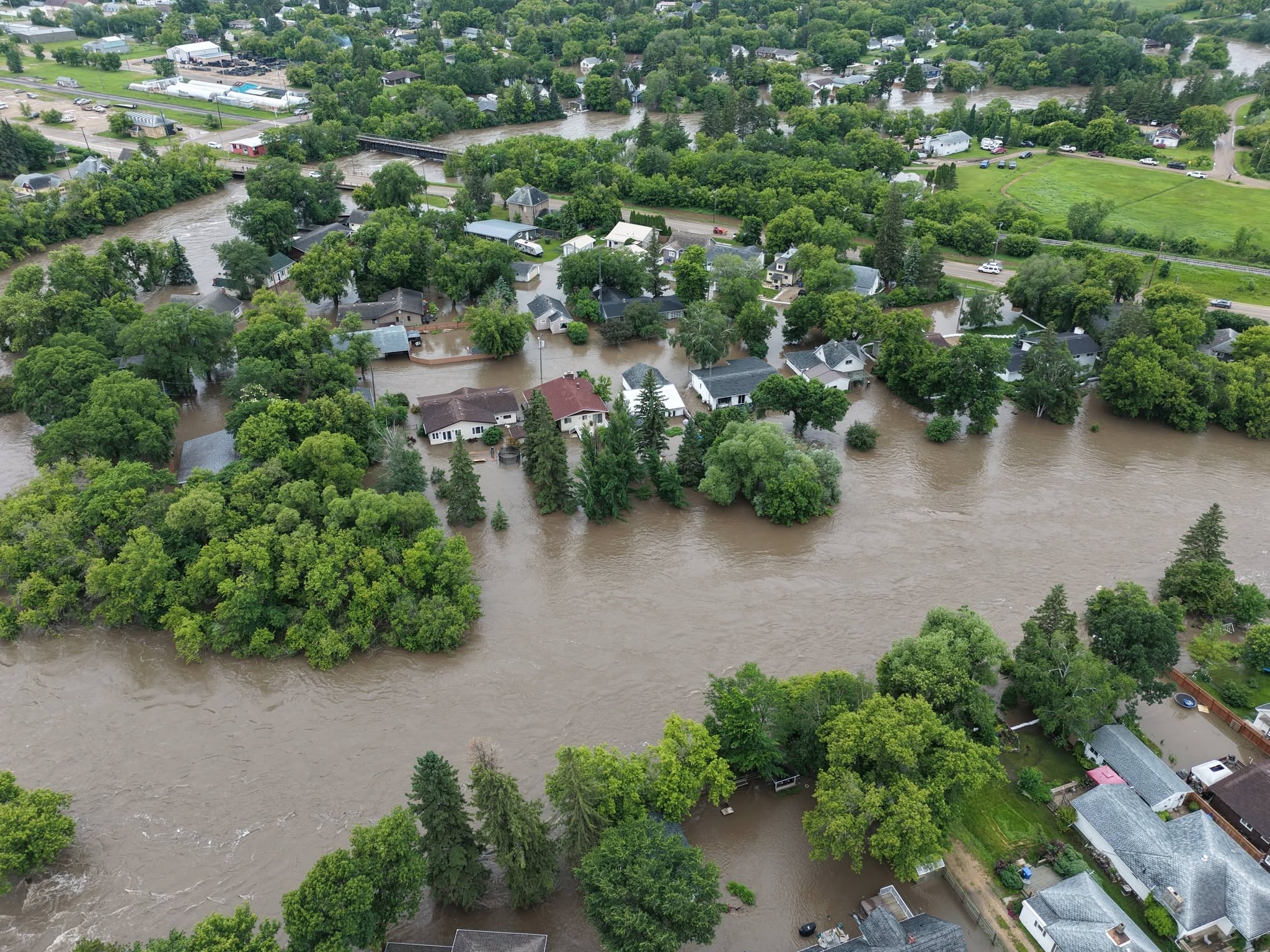 Unprecedented flooding devastates Manitoba's Parkland as travel ...