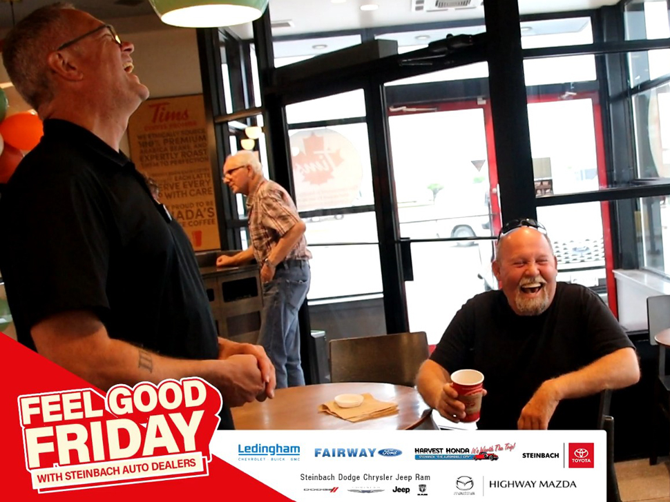 Steinbach Auto Dealers blessing people on Camp Day