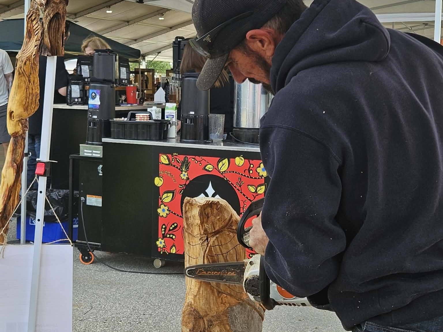 Carman chainsaw artist’s reclaimed wood carvings open doors to new connections