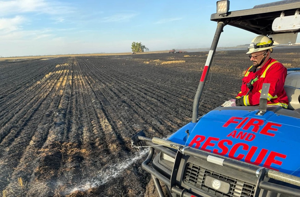 Farmers help knock down stubble fire southeast of Delisle