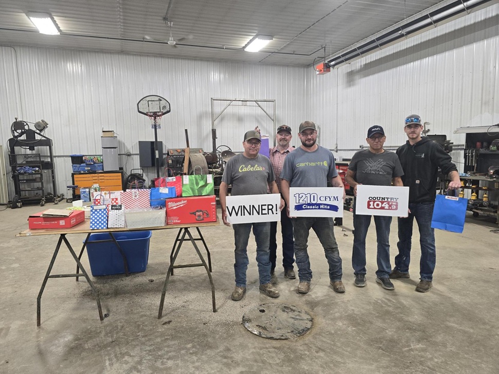 Weather slows harvest but not the spirits of the Tumbachs near Leader, Meal in the Field
